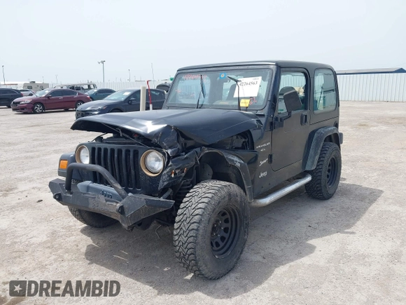 1999 Jeep Wrangler Sport z VIN 1J4FY19S0XP471848, wystawiony jako IAAI lot #42264563 z przebiegiem 280 121 mil mil oraz . Historia ofert i sprzedaży dostępna na DreamBid. Obrazek 6.