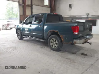 2005 Nissan Titan LE with VIN 1N6AA07B55N500154, listed as a IAAI auction lot 42455068 with 147,180 mi miles and . Bid and sale history available at DreamBid. Image 3.