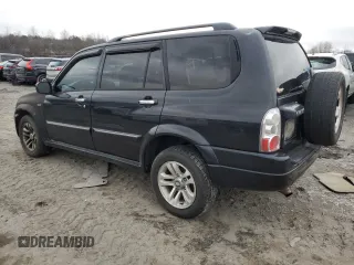 2004 Suzuki XL7 LX z VIN JS3TX92V344110661, wystawiony jako Copart lot #43613315 z przebiegiem 143 334 mil mil oraz Szkoda całkowita • Salvage title. Historia ofert i sprzedaży dostępna na DreamBid. Obrazek 2.