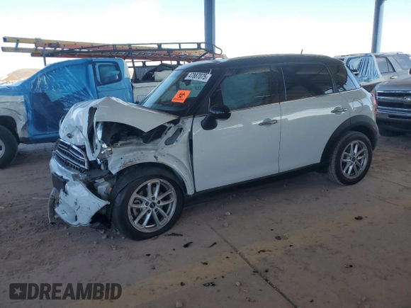 2015 MINI Countryman with VIN WMWZB3C50FWR45253, listed as a Copart auction lot 63608655 with 123,701 mi miles and Salvage title. Bid and sale history available at DreamBid. Image 1.