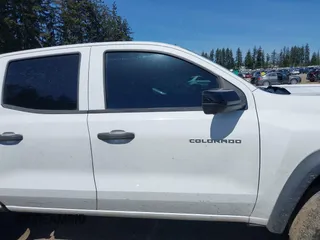 2023 Chevrolet Colorado 4WD Trail Boss with VIN 1GCPTEEK2P1203392, listed as a IAAI auction lot 42043211 with 27,589 mi miles. Bid and sale history available at carsss.com. Image 13.