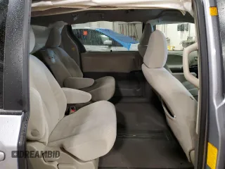 2012 Toyota Sienna LE AAS с VIN 5TDKK3DC6CS180529, выставлен на аукционе Copart как лот 55704195 с пробегом 140 470 миль миль и Чистый • Clean title. История ставок и продаж доступна на DreamBid. Изображение 11.