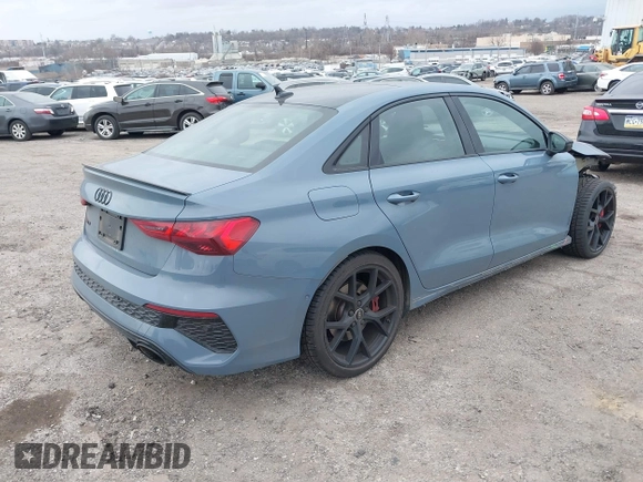 2023 Audi RS 3 with VIN WUAG4DGY9PA905303, listed as a IAAI auction lot 41728962 with 16,896 mi miles. Bid and sale history available at carsss.com. Image 4.