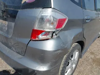 2009 Honda Fit Sport w/Navi with VIN JHMGE88619S020572, listed as a IAAI auction lot 41755126 with 202,358 mi miles. Bid and sale history available at carsss.com. Image 15.