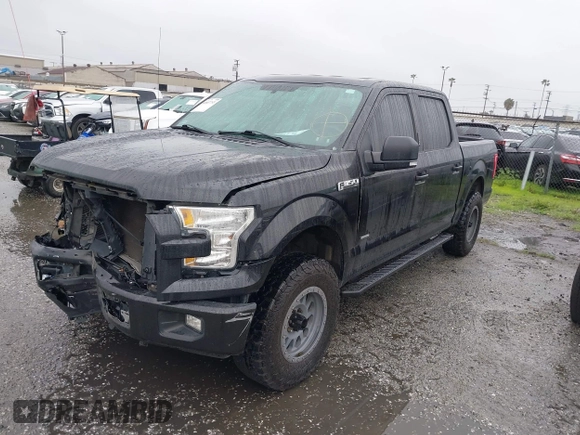 2015 Ford F-150 XL with VIN 1FTEW1CGXFKD98530, listed as a IAAI auction lot 41687753 with 104,281 mi miles. Bid and sale history available at carsss.com. Image 2.