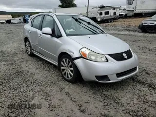 2010 Suzuki SX4 with VIN JS2YC5A49A6310256, listed as a Copart auction lot 73210584 with 135,021 mi miles and Salvage Title. Bid and sale history available at DreamBid. Image 11.
