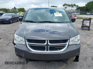 2019 Dodge Grand Caravan SE with VIN 2C4RDGBGXKR796974, listed as a IAAI auction lot 42008704 with 129,229 mi miles and . Bid and sale history available at DreamBid. Image 12.