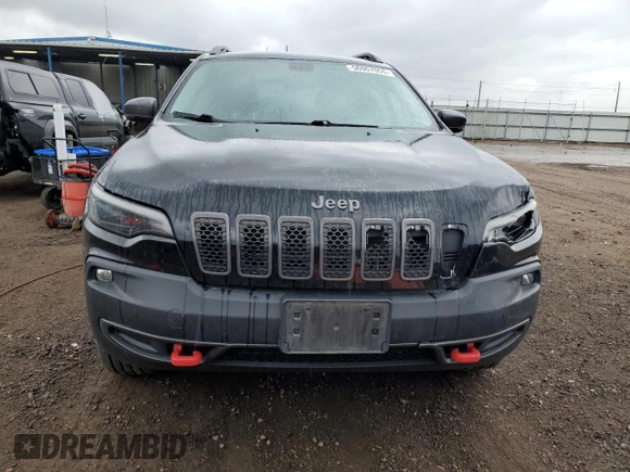 2020 Jeep Cherokee Trailhawk with VIN 1C4PJMBX2LD588381, listed as a Copart auction lot 56067055 with 82,467 mi miles and Salvage title. Bid and sale history available at DreamBid. Image 5.