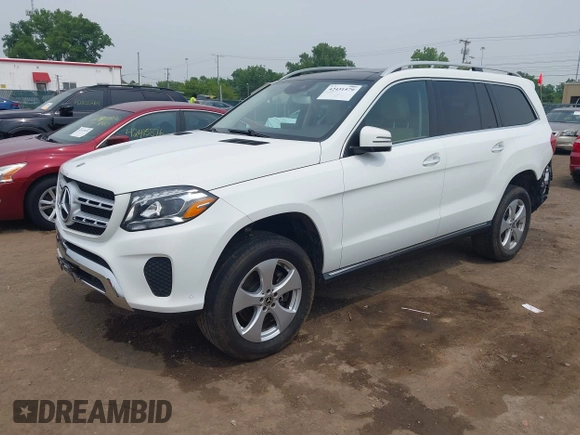 2018 Mercedes-Benz GLS 450 with VIN 4JGDF6EE2JB023644, listed as a IAAI auction lot 42431579 with 95,940 mi miles and . Bid and sale history available at DreamBid. Image 2.