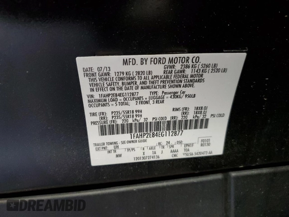2014 Ford Taurus SEL z VIN 1FAHP2E84EG112877, wystawiony jako Copart lot #52612065 z przebiegiem 103 306 mil mil oraz Szkoda całkowita • Salvage title. Historia ofert i sprzedaży dostępna na DreamBid. Obrazek 12.