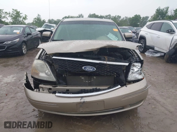 2005 Ford Five Hundred SEL z VIN 1FAFP24145G140044, wystawiony jako IAAI lot #42457383 z przebiegiem 196 564 mil mil oraz . Historia ofert i sprzedaży dostępna na DreamBid. Obrazek 12.