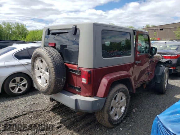 2008 Jeep Wrangler Sahara z VIN 1J4FA54198L505014, wystawiony jako Copart lot #55328045 z przebiegiem 128 049 mil mil oraz Szkoda całkowita • Salvage title. Historia ofert i sprzedaży dostępna na DreamBid. Obrazek 3.