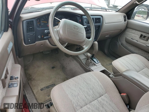 1999 Toyota Tacoma z VIN 4TAWN72N1XZ484114, wystawiony jako Copart lot #60478265 z przebiegiem 209 308 mil mil oraz Szkoda całkowita • Salvage title. Historia ofert i sprzedaży dostępna na DreamBid. Obrazek 8.