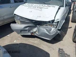 1999 Chevrolet Astro Cargo with VIN 1GCDM19W4XB141901, listed as a IAAI auction lot 41572036 with Not Provided miles. Bid and sale history available at carsss.com. Image 6.