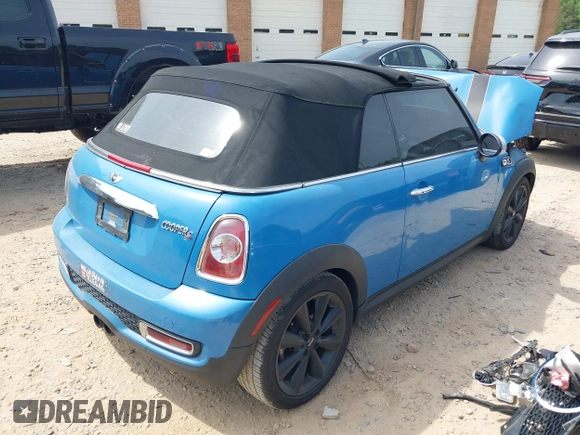 2013 MINI Convertible S with VIN WMWZP3C53DT705016, listed as a IAAI auction lot 42155802 with Not provided miles and . Bid and sale history available at DreamBid. Image 4.