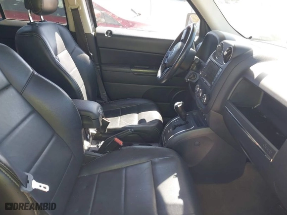 2016 Jeep Patriot Latitude with VIN 1C4NJRFBXGD673591, listed as a IAAI auction lot 41676827 with 114,632 mi miles. Bid and sale history available at carsss.com. Image 5.