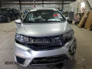 2015 Honda Fit LX with VIN 3HGGK5H53FM748495, listed as a Copart auction lot 86590994 with 124,000 mi miles and Salvage Title. Bid and sale history available at carsss.com. Image 5.