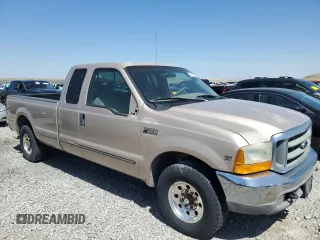 1999 Ford F-250 XL z VIN 1FTNX20S3XEA68692, wystawiony jako Copart lot #64331775 z przebiegiem 106 939 mil mil oraz Czysty tytuł • Clean title. Historia ofert i sprzedaży dostępna na DreamBid. Obrazek 4.