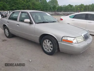 2005 Mercury Grand Marquis LS Premium z VIN 2MEFM75WX5X609110, wystawiony jako IAAI lot #42157867 z przebiegiem 311 023 mil mil oraz . Historia ofert i sprzedaży dostępna na DreamBid. Obrazek 1.