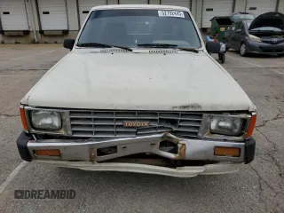 1988 Toyota Pickup z VIN JT4RN50R0J5122639, wystawiony jako Copart lot #52792445 z przebiegiem 233 407 mil mil oraz Szkody całkowita. Historia ofert i sprzedaży dostępna na DreamBid. Obrazek 5.