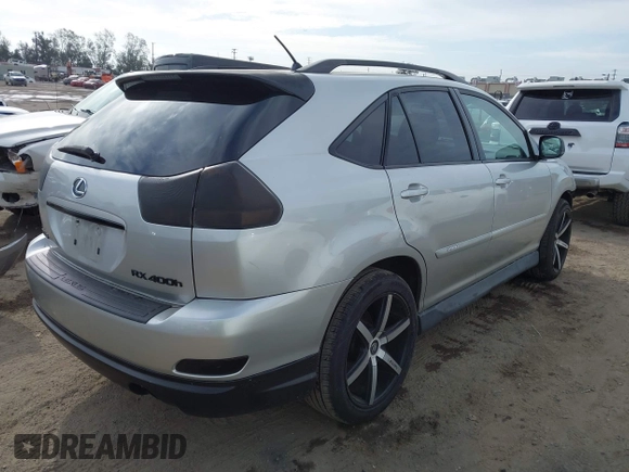 2006 Lexus RX 400h z VIN JTJHW31U660042456, wystawiony jako IAAI lot #41893361 z przebiegiem 162 061 mil mil oraz . Historia ofert i sprzedaży dostępna na DreamBid. Obrazek 4.