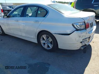 2013 BMW 5 Series 528i with VIN WBAXG5C56DDY31982, listed as a IAAI auction lot 40906428 with 248,336 mi miles and . Bid and sale history available at carsss.com. Image 3.