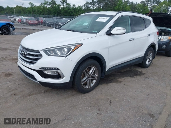 2018 Hyundai Santa Fe 2.4L z VIN 5XYZUDLB1JG543837, wystawiony jako IAAI lot #42235471 z przebiegiem 157 909 mil mil oraz . Historia ofert i sprzedaży dostępna na DreamBid. Obrazek 17.