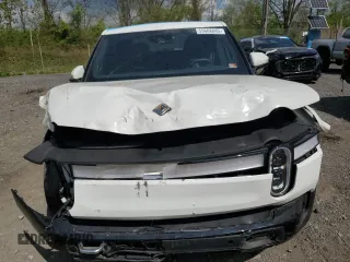 2022 Rivian R1T Adventure z VIN 7FCTGAAA8NN016263, wystawiony jako Copart lot #55668845 z przebiegiem 27 864 mil mil oraz Szkody całkowita. Historia ofert i sprzedaży dostępna na DreamBid. Obrazek 5.