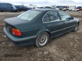 2000 BMW 5 Series 528iA with VIN WBADM6346YGU20515, listed as a Copart auction lot 43608485 with 197,903 mi miles and Salvage Title. Bid and sale history available at carsss.com. Image 3.