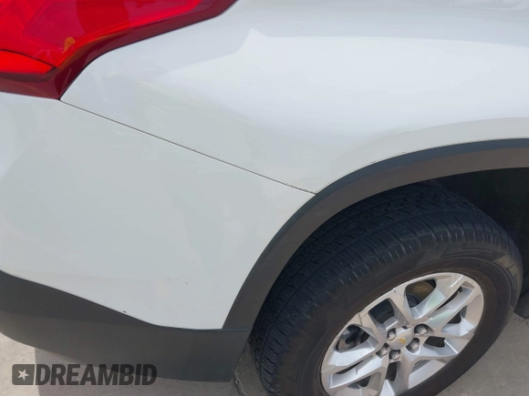 2020 Chevrolet Traverse LS z VIN 1GNERFKW4LJ163269, wystawiony jako IAAI lot #42138503 z przebiegiem 161 619 mil mil oraz . Historia ofert i sprzedaży dostępna na DreamBid. Obrazek 18.