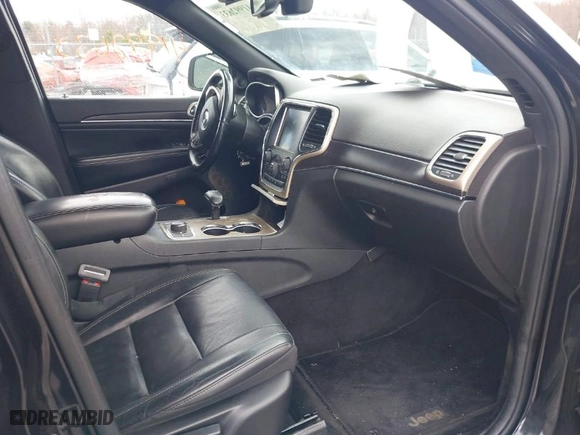 2014 Jeep Grand Cherokee Limited with VIN 1C4RJFBG2EC479268, listed as a IAAI auction lot 41992633 with 124,629 mi miles. Bid and sale history available at carsss.com. Image 5.