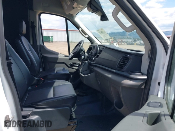 2023 Ford Transit Cargo z VIN 1FTBR1C89PKB34445, wystawiony jako IAAI lot #42414755 z przebiegiem 30 593 mil mil oraz . Historia ofert i sprzedaży dostępna na DreamBid. Obrazek 5.