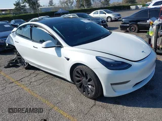 2022 Tesla Model 3 Performance z VIN 5YJ3E1EC4NF179188, wystawiony jako IAAI lot #40487457 z przebiegiem 37 979 mil mil oraz . Historia ofert i sprzedaży dostępna na DreamBid. Obrazek 1.