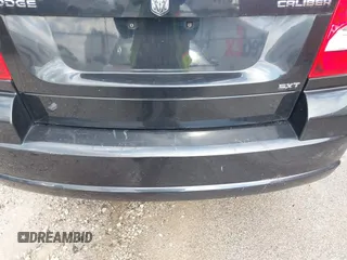 2010 Dodge Caliber SXT z VIN 1B3CB4HA4AD662848, wystawiony jako IAAI lot #42219069 z przebiegiem 177 644 mil mil oraz . Historia ofert i sprzedaży dostępna na DreamBid. Obrazek 13.