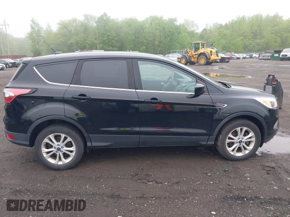 2017 Ford Escape SE with VIN 1FMCU9GD3HUD90154, listed as a IAAI auction lot 42181078 with 106,143 mi miles and . Bid and sale history available at DreamBid. Image 13.