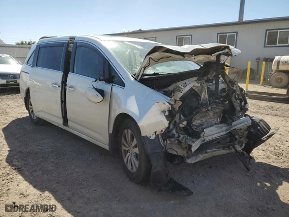 2014 Honda Odyssey EX-L with VIN 5FNRL5H68EB001488, listed as a Copart auction lot 84747054 with 123,583 mi miles and Salvage Title. Bid and sale history available at carsss.com. Image 4.