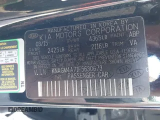 2015 Kia Optima LX with VIN KNAGM4A71F5630673, listed as a IAAI auction lot 42106584 with 245,005 mi miles and . Bid and sale history available at carsss.com. Image 9.