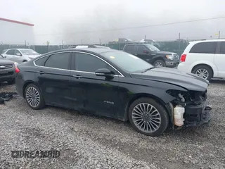 2018 Ford Fusion Titanium with VIN 3FA6P0RU7JR182119, listed as a IAAI auction lot 41984816 with 146,748 mi miles and . Bid and sale history available at DreamBid. Image 14.