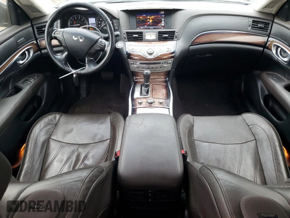 2011 Infiniti M with VIN JN1BY1AR5BM372565, listed as a Copart auction lot 84154384 with 318,255 mi miles and Salvage Title. Bid and sale history available at carsss.com. Image 8.