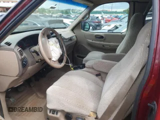 1999 Ford F-150 XL z VIN 1FTRX18LXXNB23891, wystawiony jako Copart lot #61445645 z przebiegiem 179 410 mil mil oraz Szkoda całkowita • Salvage title. Historia ofert i sprzedaży dostępna na DreamBid. Obrazek 7.