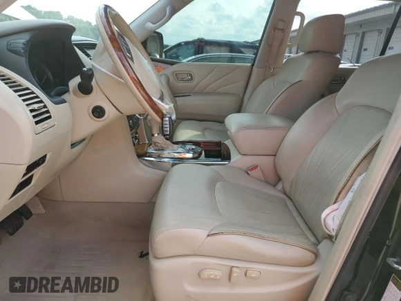 2015 Infiniti QX80 with VIN JN8AZ2NF7F9572565, listed as a Copart auction lot 58494415 with 122,609 mi miles and Salvage title. Bid and sale history available at DreamBid. Image 7.