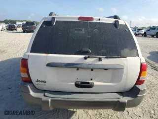 2002 Jeep Grand Cherokee Laredo with VIN 1J4GW48S12C312348, listed as a Copart auction lot 51786715 with 229,698 mi miles and Clean Title. Bid and sale history available at carsss.com. Image 6.