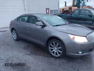 2012 Buick LaCrosse Touring with VIN 1G4GJ5G3XCF100015, listed as a IAAI auction lot 40692190 with 139,228 mi miles and . Bid and sale history available at DreamBid. Image 1.