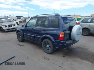 2003 Suzuki Grand Vitara z VIN JS3TE62VX34101877, wystawiony jako IAAI lot #42360315 z przebiegiem 171 207 mil mil oraz . Historia ofert i sprzedaży dostępna na DreamBid. Obrazek 3.