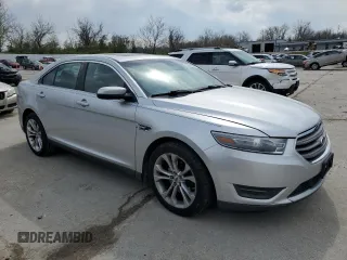 2013 Ford Taurus SEL with VIN 1FAHP2E81DG159721, listed as a Copart auction lot 52616535 with 136,677 mi miles and Salvage Title. Bid and sale history available at carsss.com. Image 4.