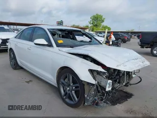 2014 Audi A6 Premium Plus with VIN WAUFGAFC6EN077234, listed as a IAAI auction lot 42498775 with 36,354 mi miles and . Bid and sale history available at DreamBid. Image 1.
