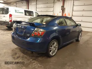 2009 Scion tC with VIN JTKDE167990297921, listed as a IAAI auction lot 41720687 with 159,960 mi miles. Bid and sale history available at carsss.com. Image 4.