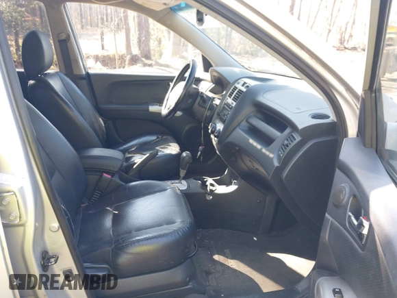 2005 Kia Sportage LX with VIN KNDJF723057130569, listed as a IAAI auction lot 41509247 with 155,777 mi miles and . Bid and sale history available at carsss.com. Image 5.