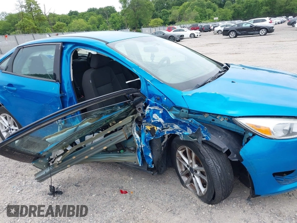 2015 Ford Focus SE z VIN 1FADP3F26FL252212, wystawiony jako IAAI lot #42345763 z przebiegiem 102 549 mil mil oraz . Historia ofert i sprzedaży dostępna na DreamBid. Obrazek 6.