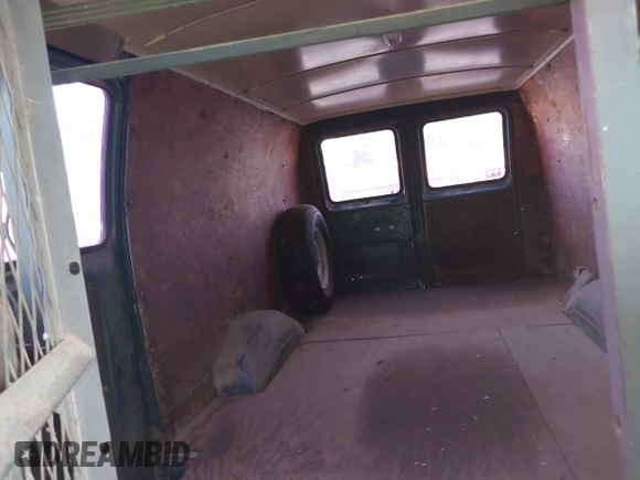 1990 Ford Econoline Cargo with VIN 1FTES14YXLHA99552, listed as a IAAI auction lot 41820558 with 178,000 mi miles and . Bid and sale history available at DreamBid. Image 8.